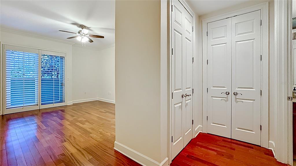 660 Osceola Avenue, Unit 101 Winter Park, FL 32789 - Photo 34 of 65 a view of a room with wooden floor and cabinet