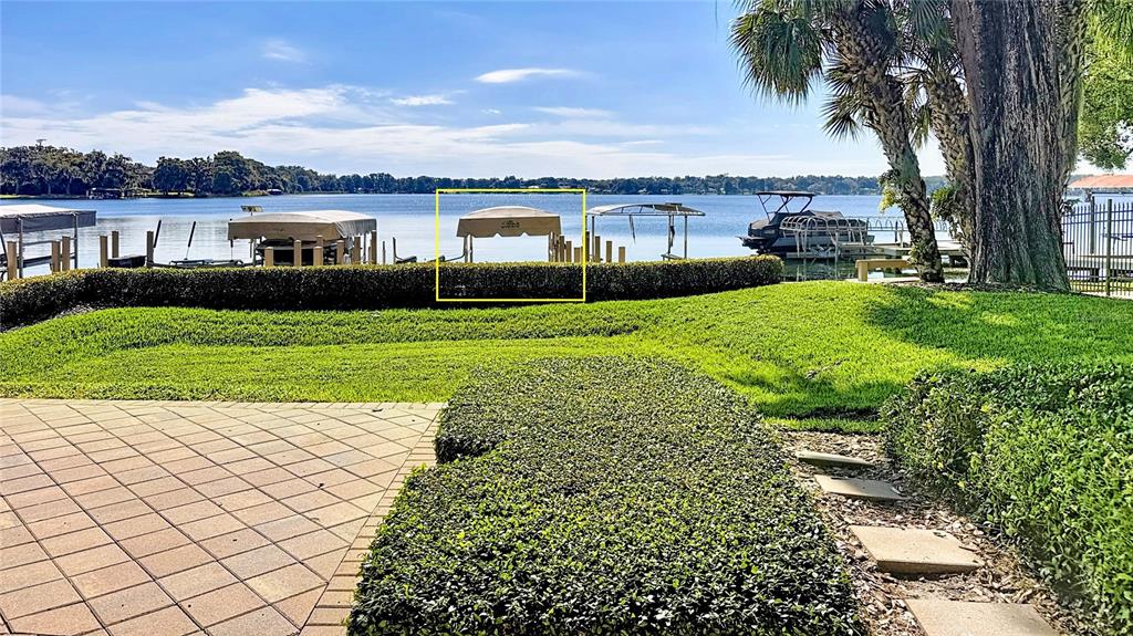 660 Osceola Avenue, Unit 101 Winter Park, FL 32789 - Photo 49 of 65 a view of a lake with a house