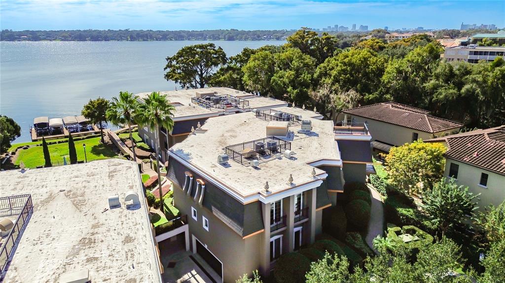 660 Osceola Avenue, Unit 101 Winter Park, FL 32789 - Photo 59 of 65 an aerial view of a house with outdoor space and lake view