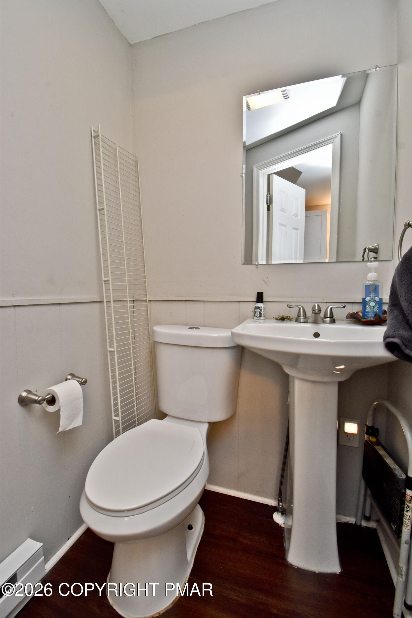 201 Buckhill Road Albrightsville, PA 18210 - Photo 12 of 32 a bathroom with a toilet a sink and mirror