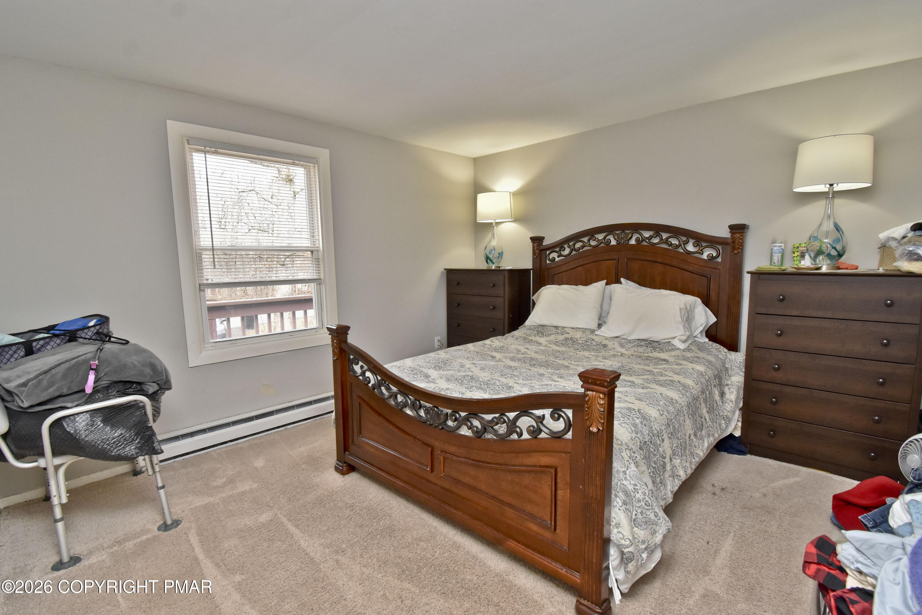 201 Buckhill Road Albrightsville, PA 18210 - Photo 13 of 32 a bedroom with a bed and window
