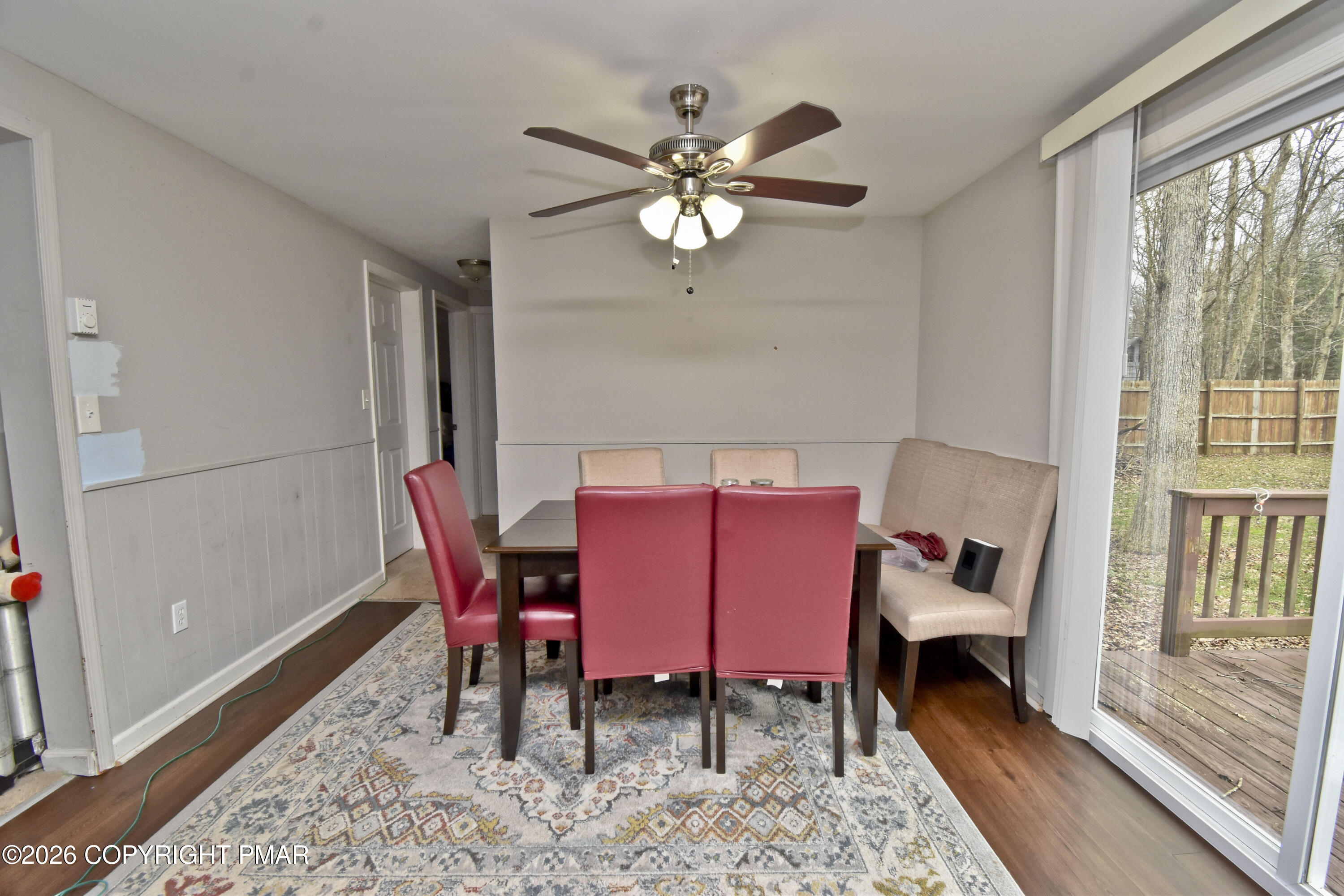 201 Buckhill Road Albrightsville, PA 18210 - Photo 3 of 32 a dining room with furniture a rug and a chandelier