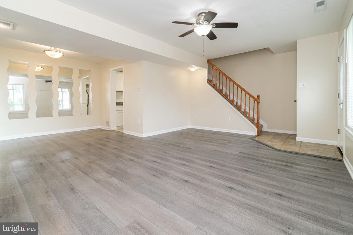 76 King Henry Circle, Unit 76B Baltimore, MD 21237 - Photo 3 of 29 a view of an entryway with wooden floor