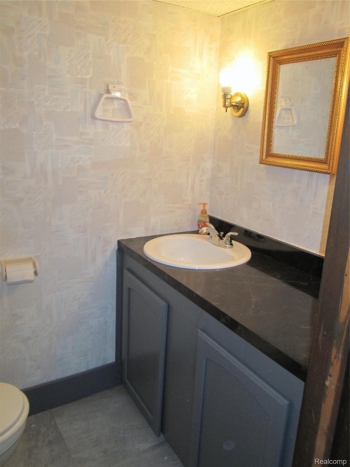415 Sherbourne Street Inkster, MI 48141 - Photo 23 of 25 Half Bath.jpg