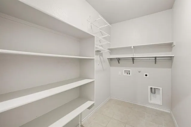 a view of an empty walk in closet