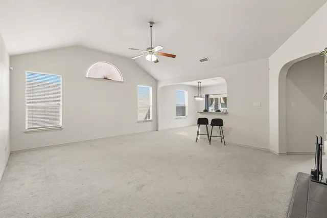 a view of livingroom and kitchen with sink