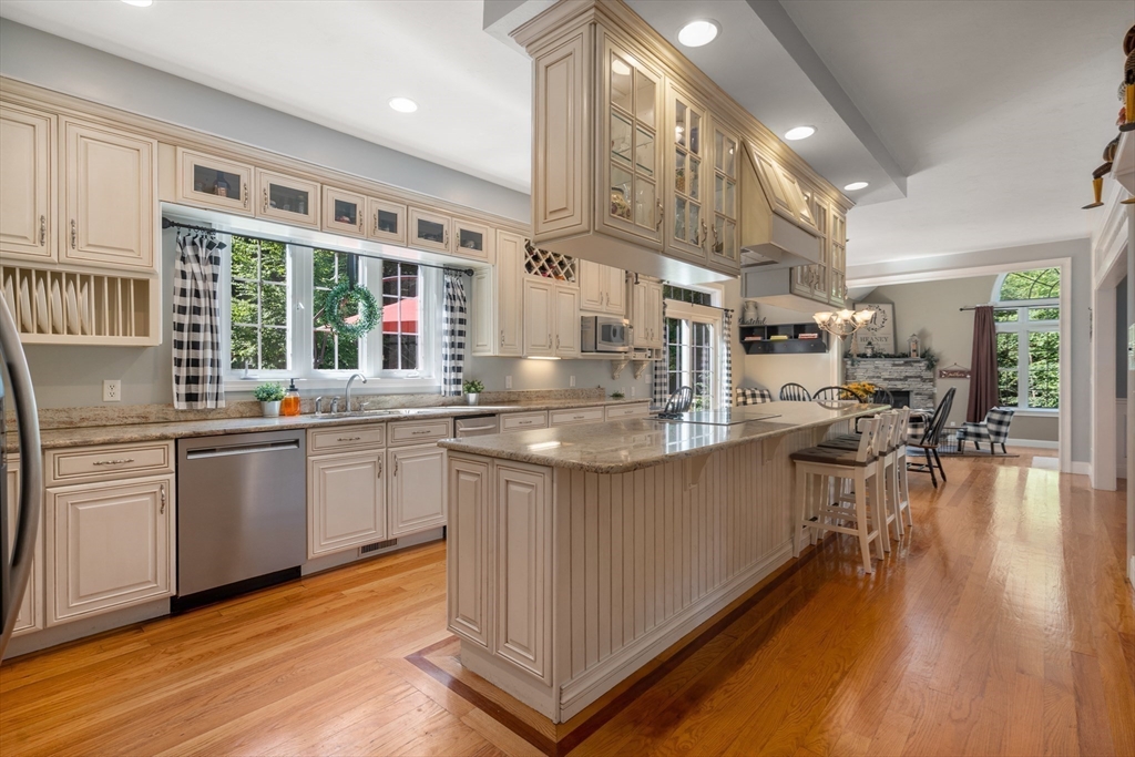 400 New Boston Road Sturbridge, MA 01566 - Photo 12 of 42 a kitchen with stainless steel appliances granite countertop a lot of counter space and a sink