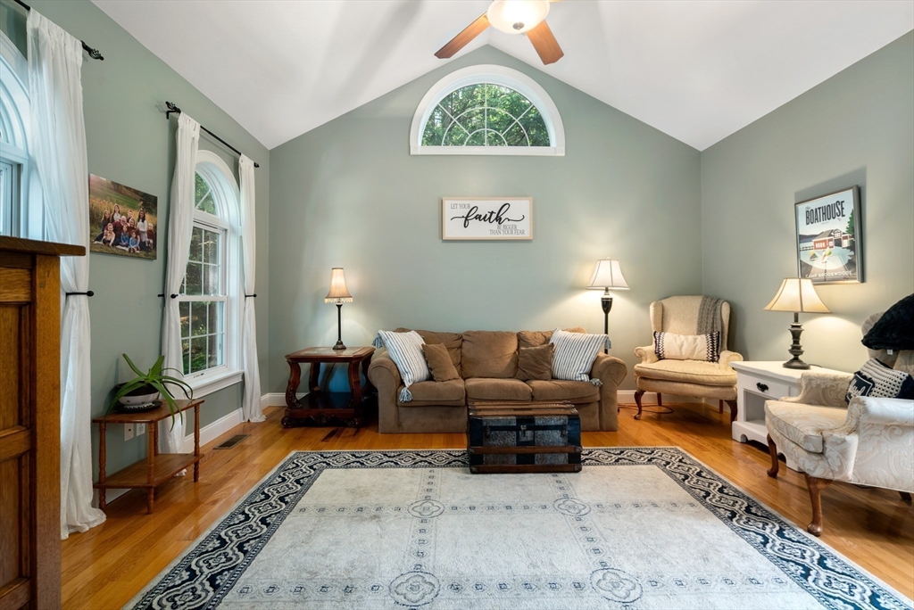 400 New Boston Road Sturbridge, MA 01566 - Photo 23 of 42 a living room with furniture wooden floor and a rug