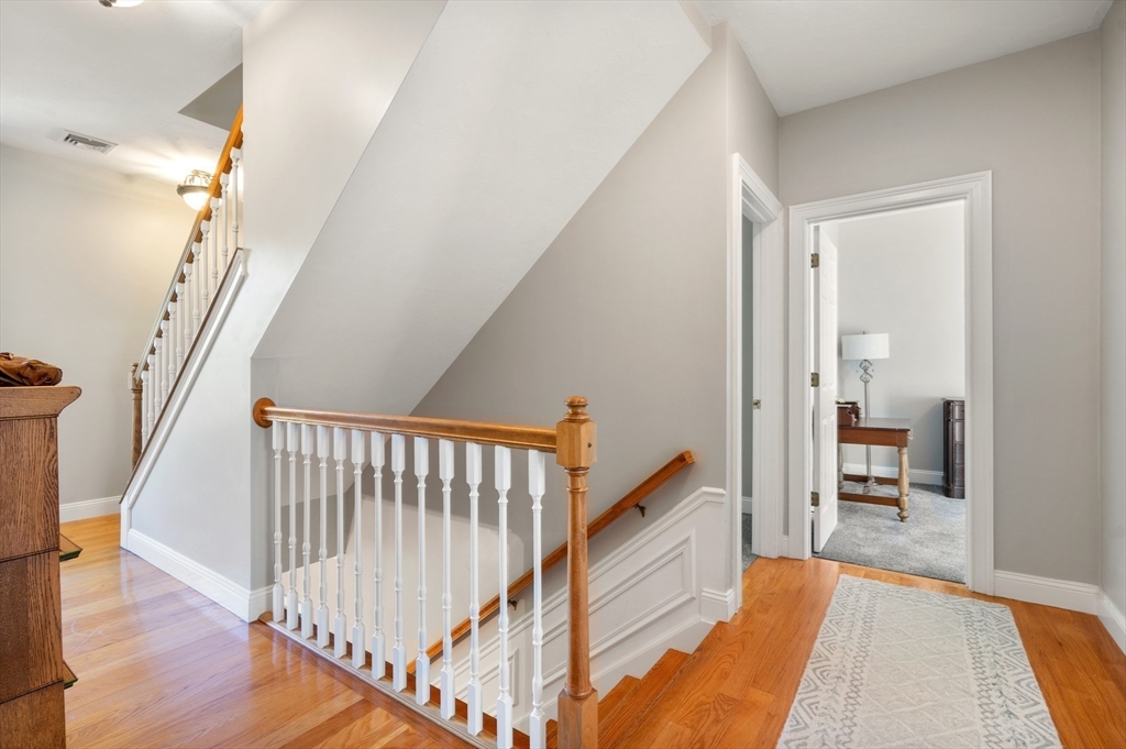 400 New Boston Road Sturbridge, MA 01566 - Photo 26 of 42 a view of a hallway with wooden floor and staircase