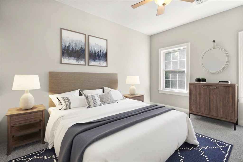 400 New Boston Road Sturbridge, MA 01566 - Photo 32 of 42 a bedroom with a large bed and a window