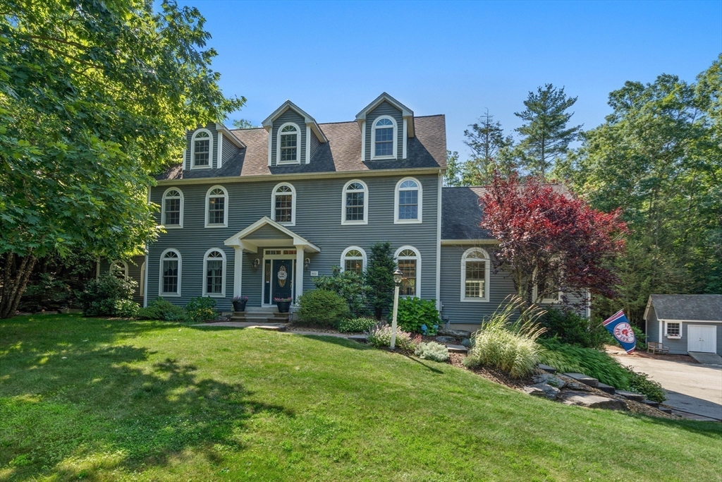 400 New Boston Road Sturbridge, MA 01566 - Photo 42 of 42 a front view of a house with a yard