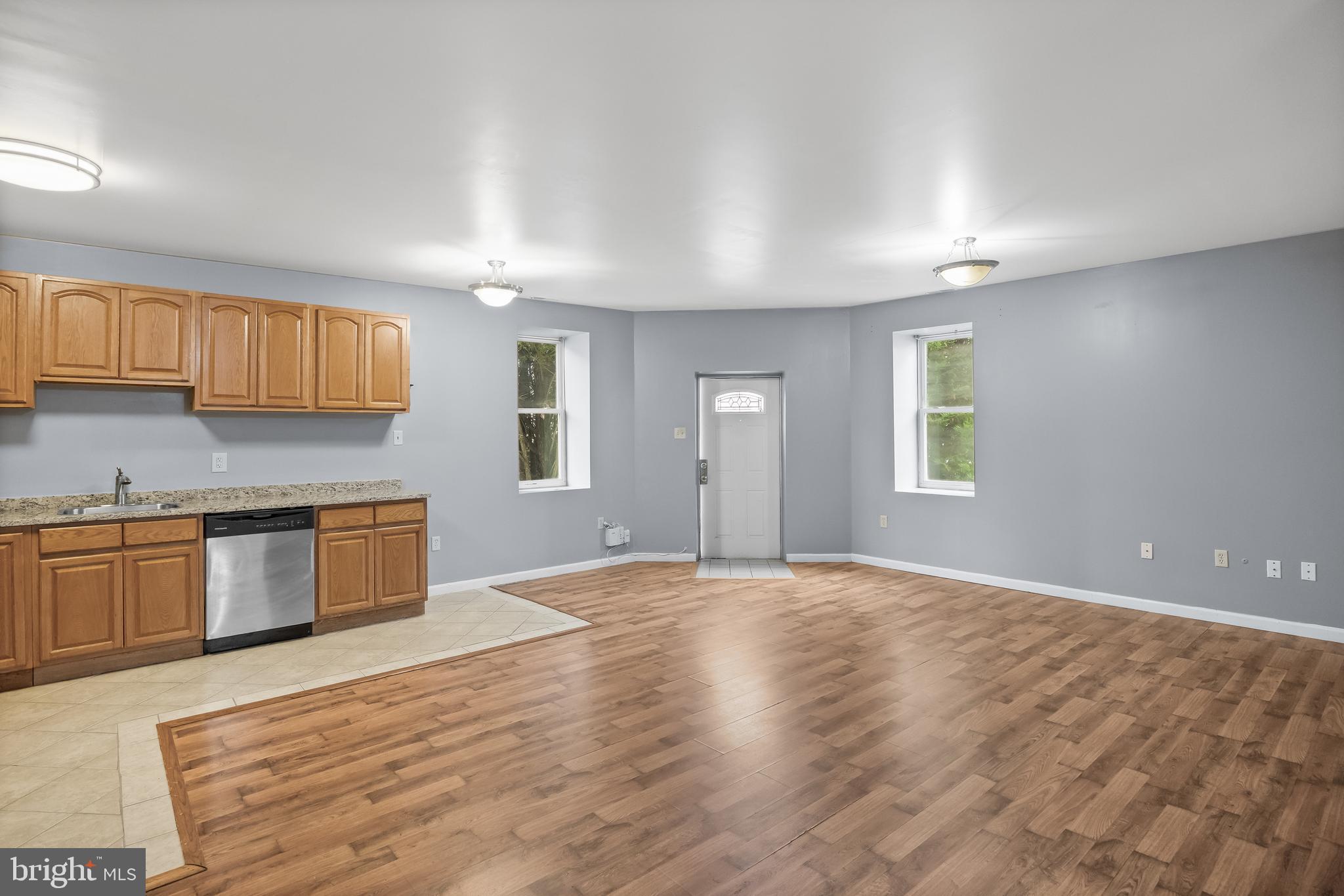 7 East Mill Road Maple Shade, NJ 08052 - Photo 5 of 11 LARGE LIVING ROOM VIEW TOWARDS FRONT DOOR FROM DR