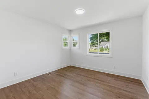 an empty room with windows