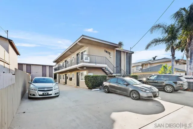 a car parked in front of a house