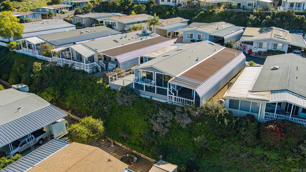 4650 Dulin Road, Unit 111 Fallbrook, CA 92003 - Photo 31 of 35 an aerial view of a house with a garden space