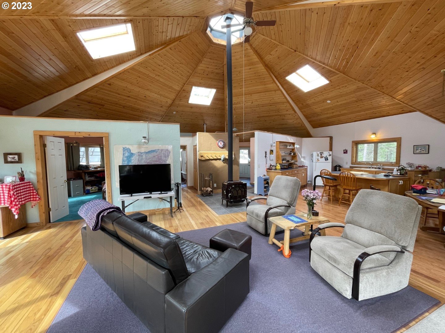 60535 Tucker Down Road Joseph, OR 97846 - Photo 5 of 37 a outdoor living space with furniture and a flat screen tv