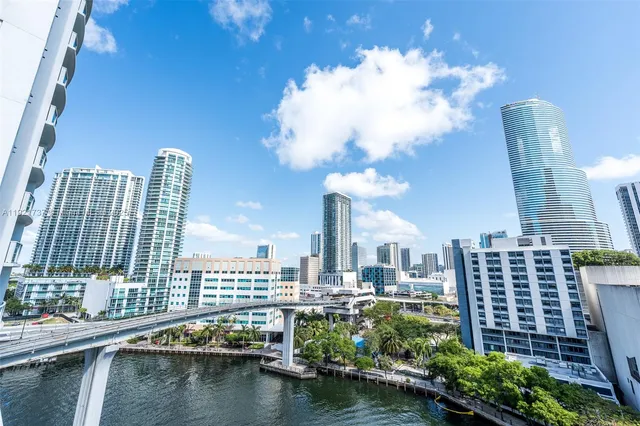 a view of a city with tall buildings