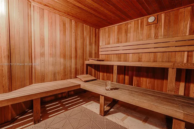 a reading room with furniture and a window