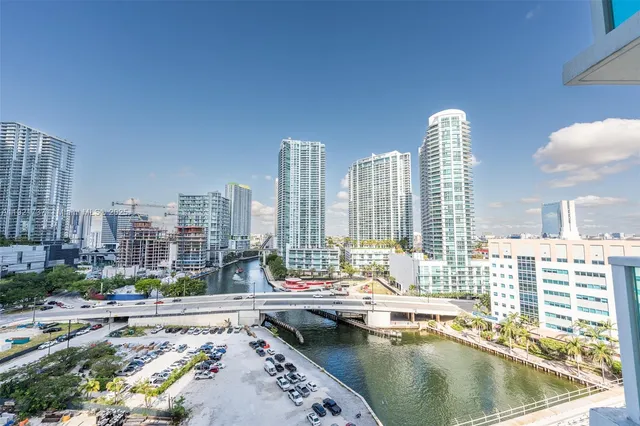 a view of a swimming pool with outdoor seating