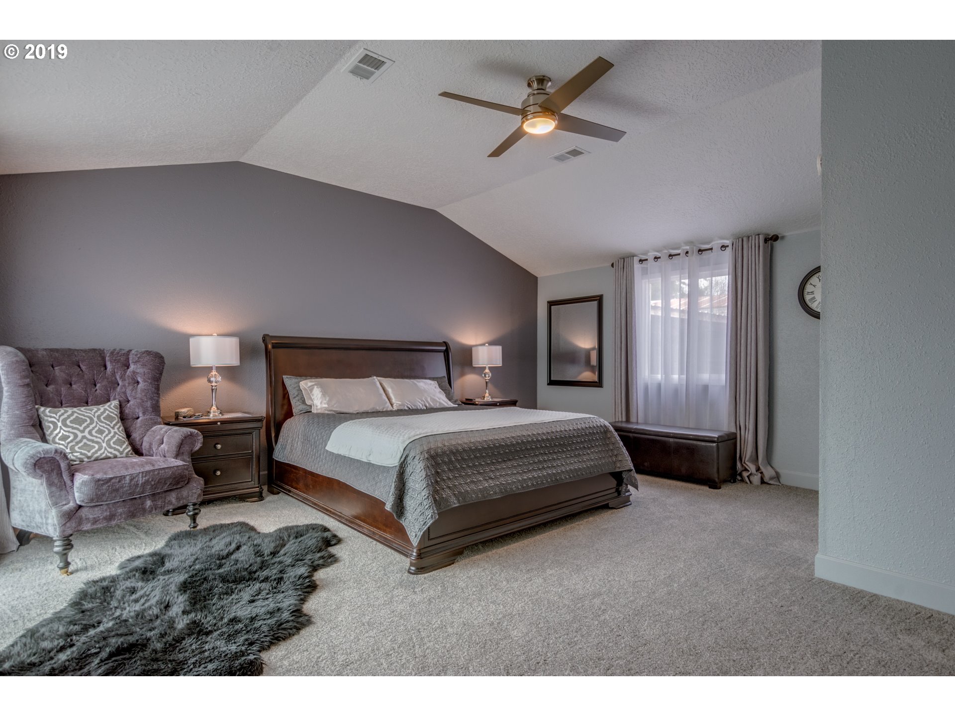 11379 Southwest Spring Hill Road Gaston, OR 97119 - Photo 15 of 28 a bedroom with a bed a couch and dresser