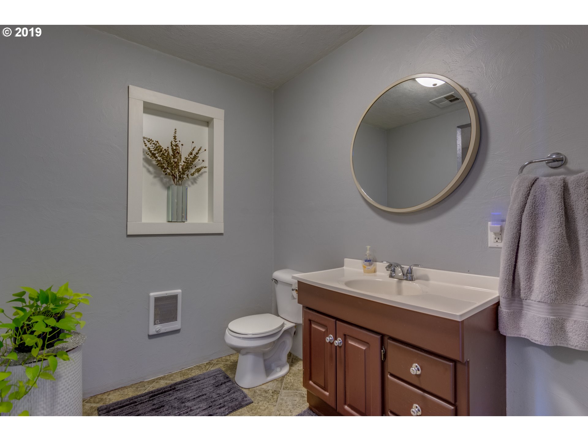 11379 Southwest Spring Hill Road Gaston, OR 97119 - Photo 17 of 28 a bathroom with a sink vanity and toilet
