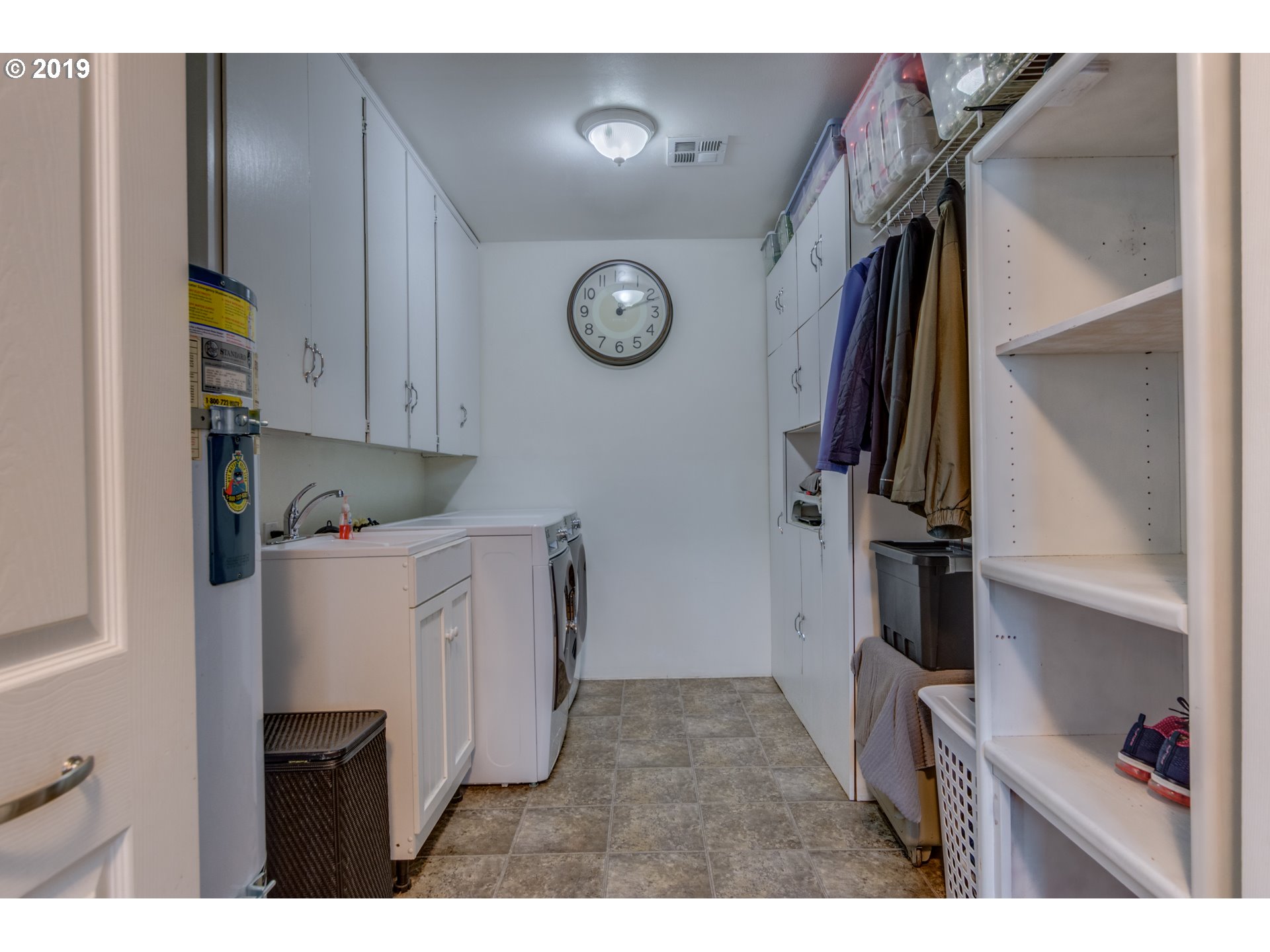 11379 Southwest Spring Hill Road Gaston, OR 97119 - Photo 18 of 28 a kitchen with a refrigerator and a stove