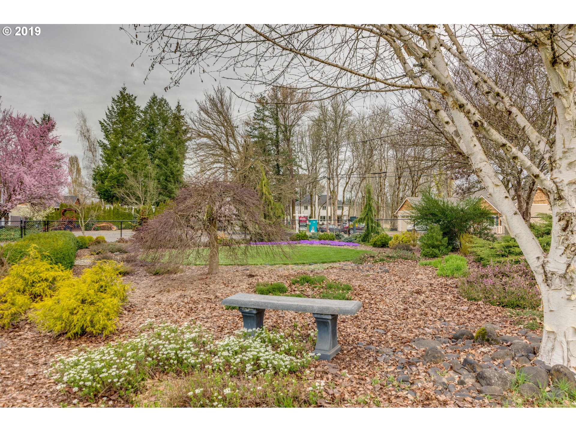 11379 Southwest Spring Hill Road Gaston, OR 97119 - Photo 20 of 28 a backyard of a house with lots of green space