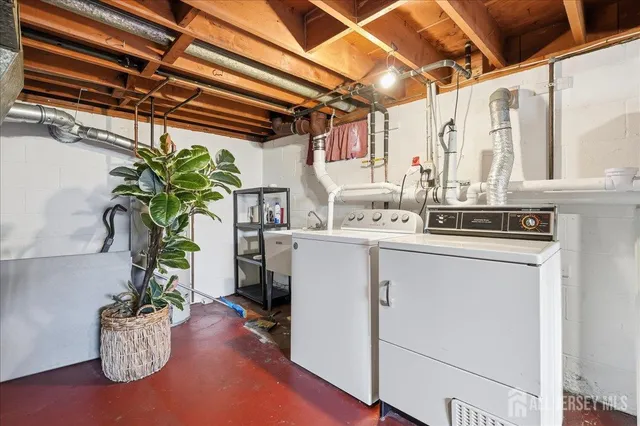 a view of kitchen with appliances and cabinets