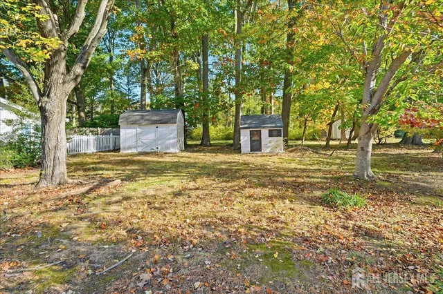 a view of a yard with an outdoor space