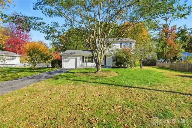 a house view with a garden space