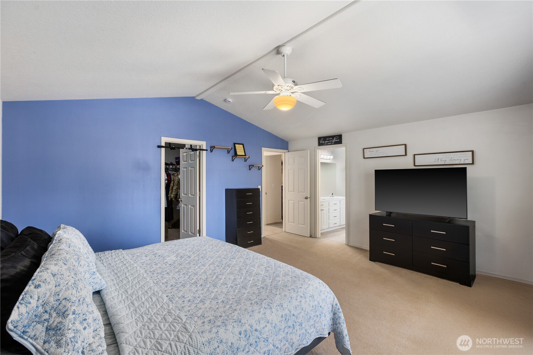 8305 Sweetbrier Loop Southeast Olympia, WA 98513 - Photo 30 of 40 a bed room with a bed and a television