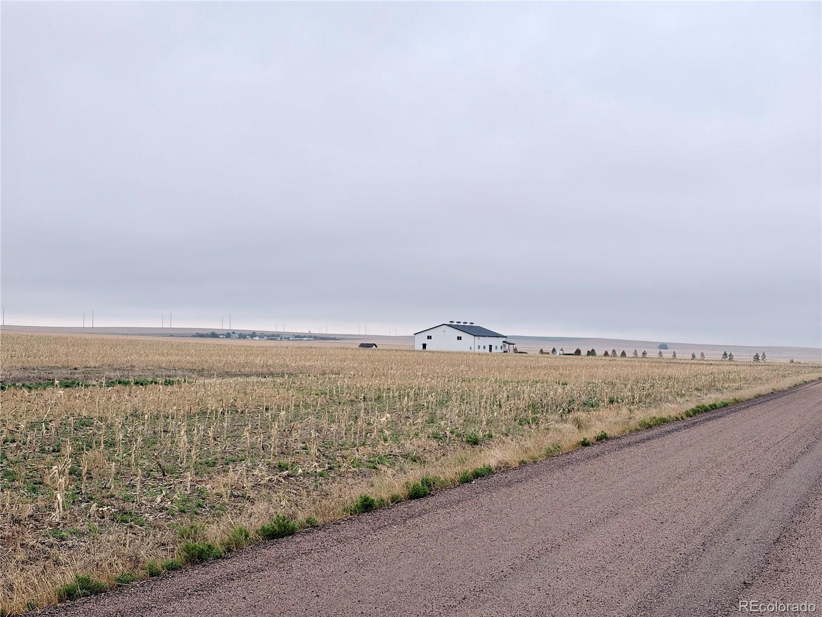 9650 North Manila Road Bennett, CO 80102 - Photo 8 of 12 an aerial view of beach and city