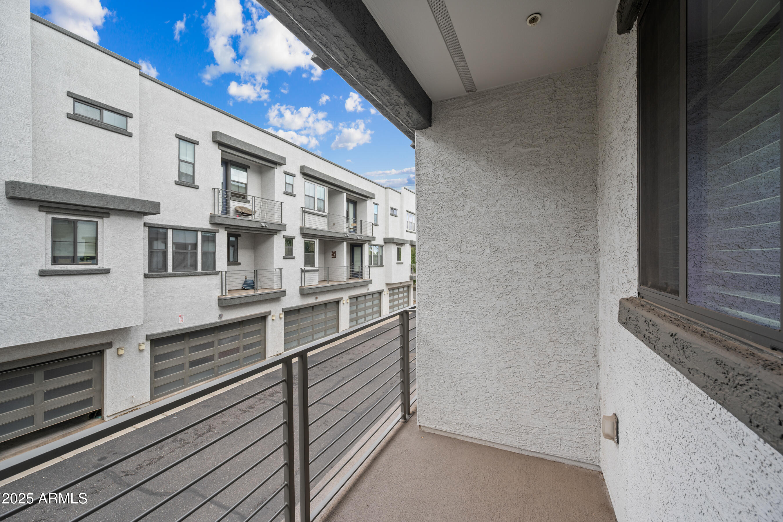 2090 South Dorsey Lane, Unit 1004 Tempe, AZ 85282 - Photo 16 of 31 a view of a balcony with staircase