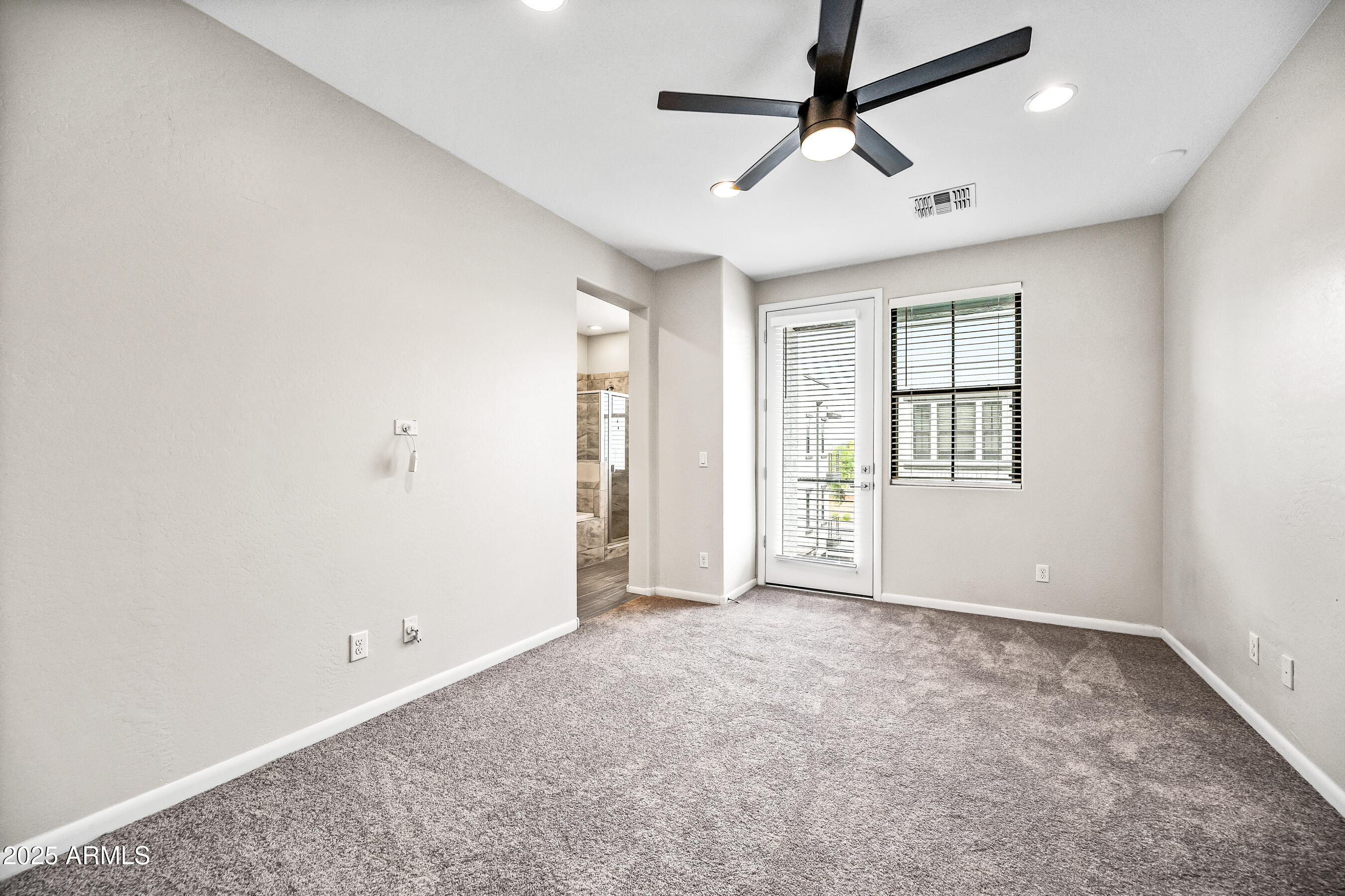 2090 South Dorsey Lane, Unit 1004 Tempe, AZ 85282 - Photo 18 of 31 a view of an empty room with a window