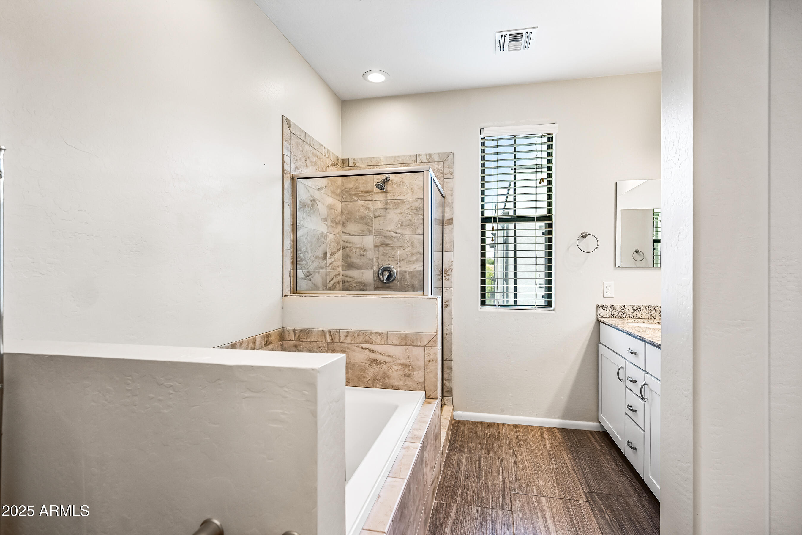 2090 South Dorsey Lane, Unit 1004 Tempe, AZ 85282 - Photo 21 of 31 a view of a kitchen with wooden floor and a window