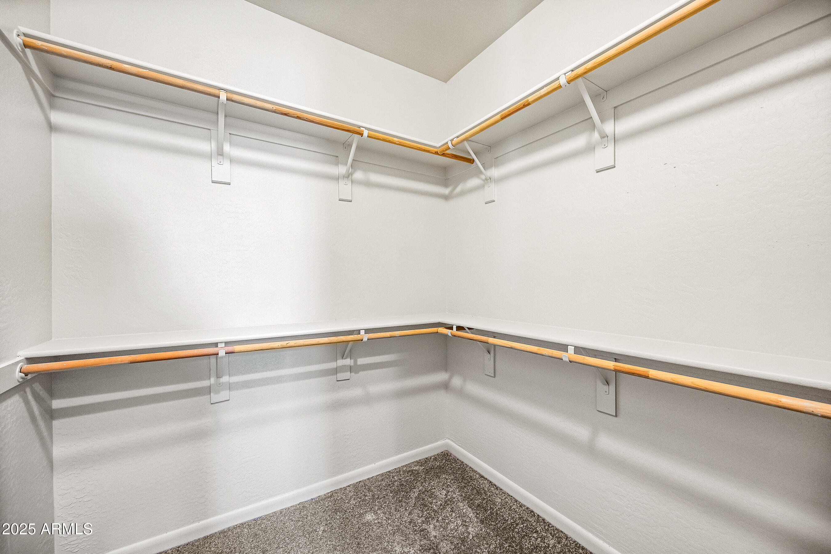 2090 South Dorsey Lane, Unit 1004 Tempe, AZ 85282 - Photo 23 of 31 a view of a room with racks on the wall