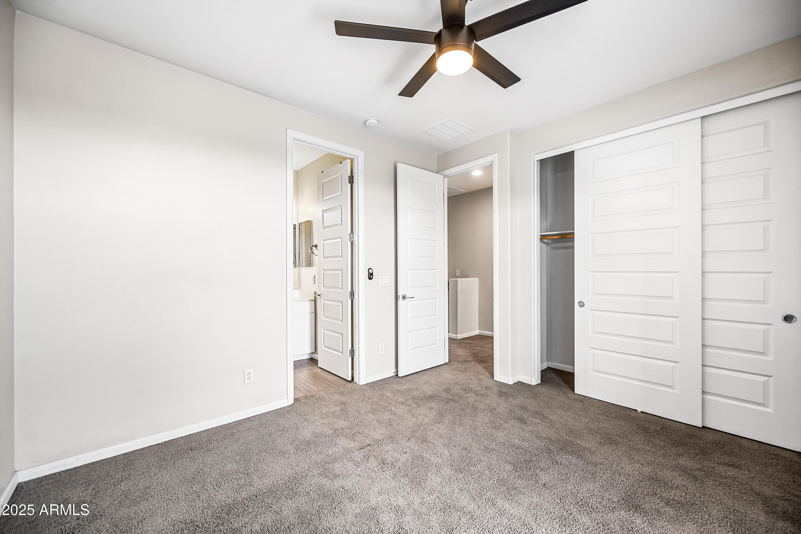 2090 South Dorsey Lane, Unit 1004 Tempe, AZ 85282 - Photo 26 of 31 an empty room with closet