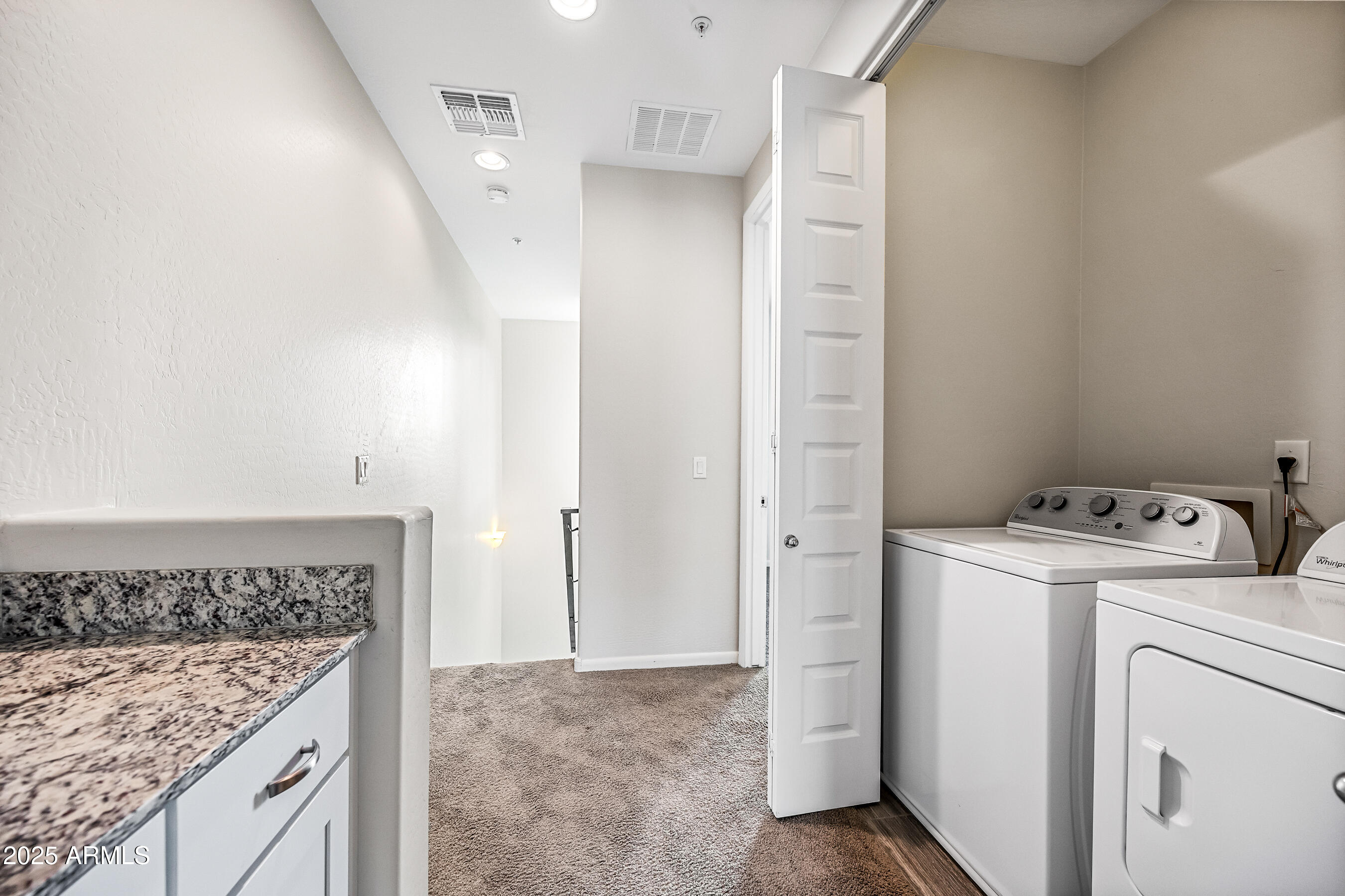 2090 South Dorsey Lane, Unit 1004 Tempe, AZ 85282 - Photo 28 of 31 a utility room with dryer and washer