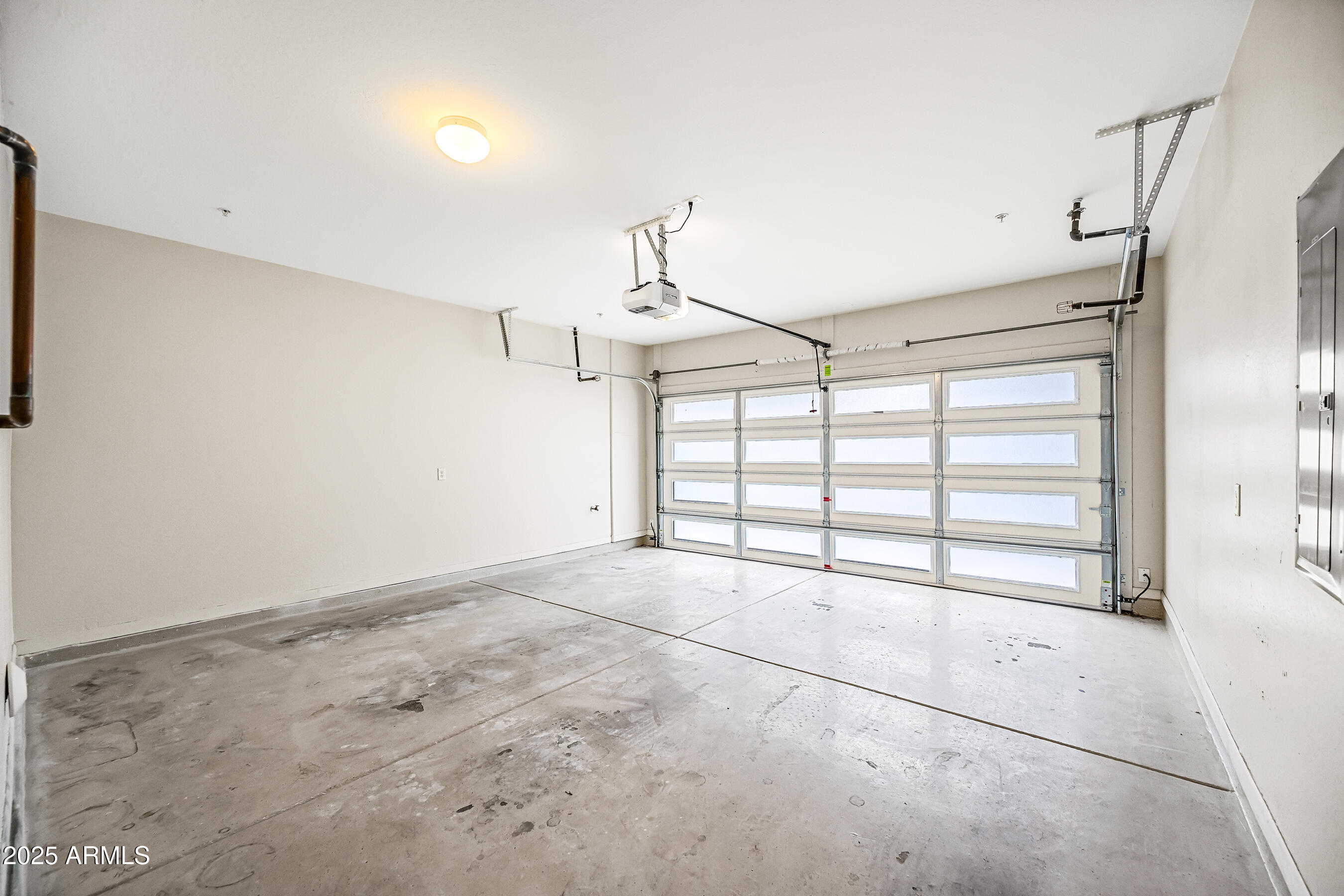 2090 South Dorsey Lane, Unit 1004 Tempe, AZ 85282 - Photo 29 of 31 a view of a garage