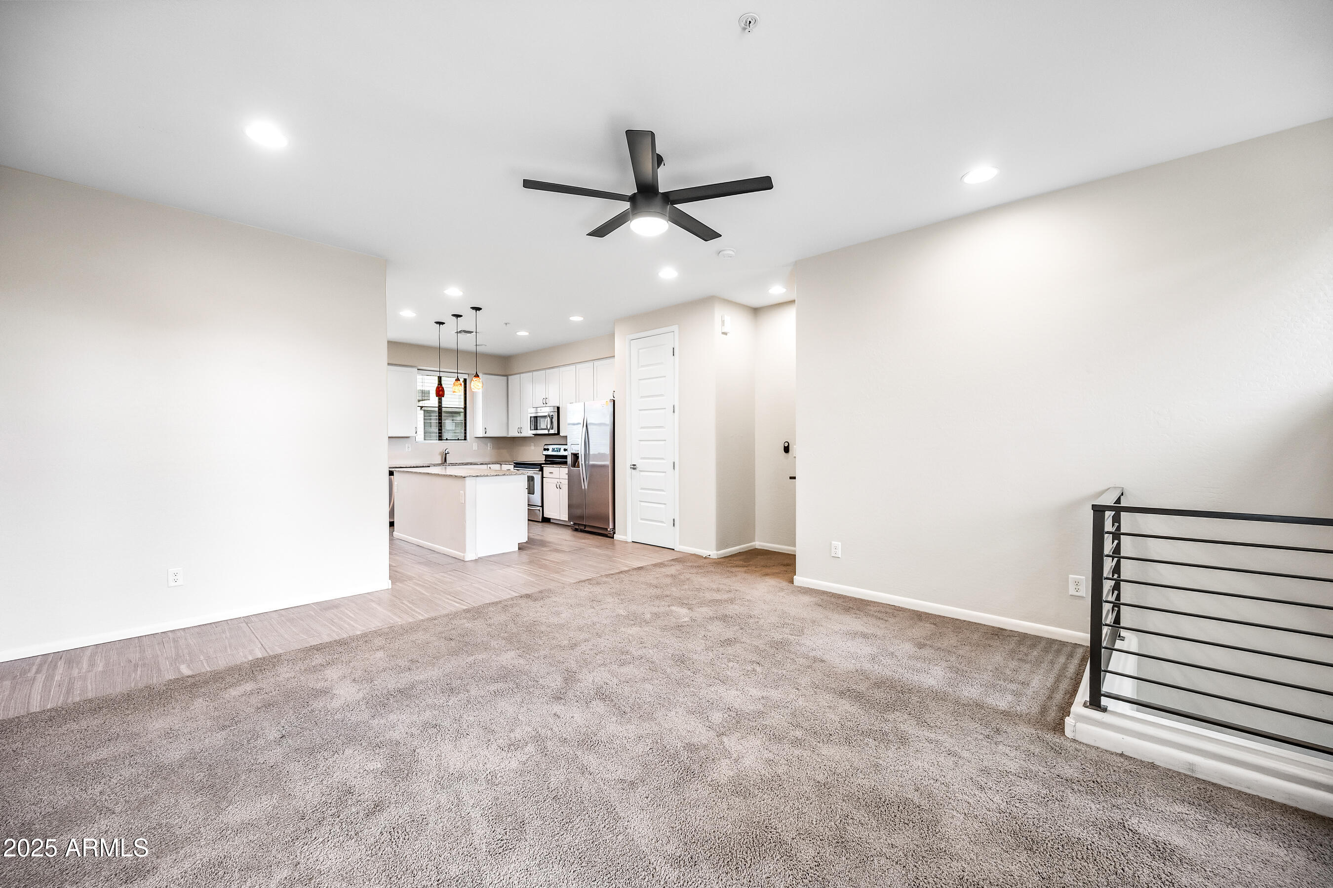 2090 South Dorsey Lane, Unit 1004 Tempe, AZ 85282 - Photo 9 of 31 a view of a kitchen with a sink and cabinets