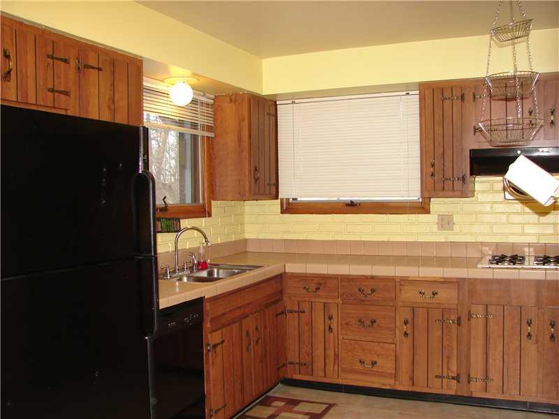 127 Parkview Road Pittsburgh, PA 15237 - Photo 9 of 25 Kitchen. Kitchen features a NEW dishwasher, refrigerator, gas cooktop and built in electic oven.