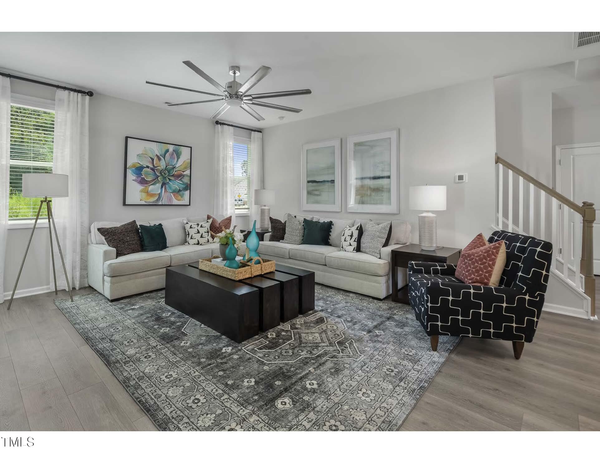 69 White Azalea Way Benson, NC 27504 - Photo 5 of 17 a living room with furniture wooden floor and window