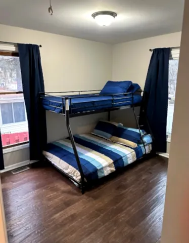 a bedroom with bunk bed