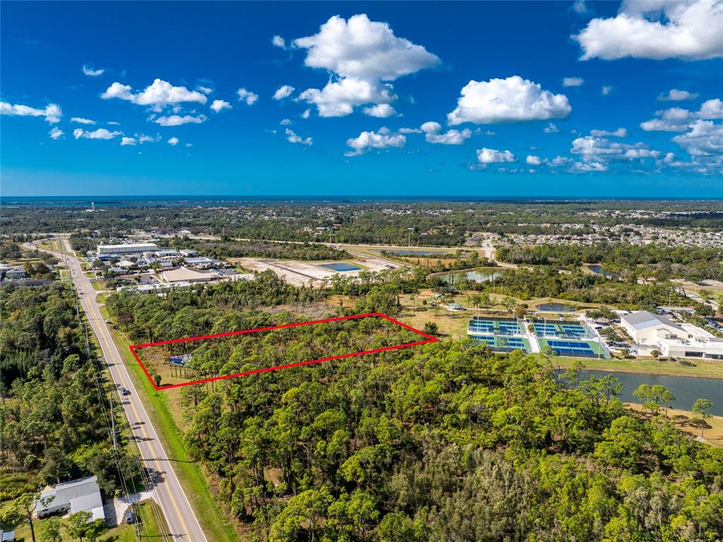 1060 South River Road Englewood, FL 34223 - Photo 9 of 14 a view of a room with lots of yellow lighting