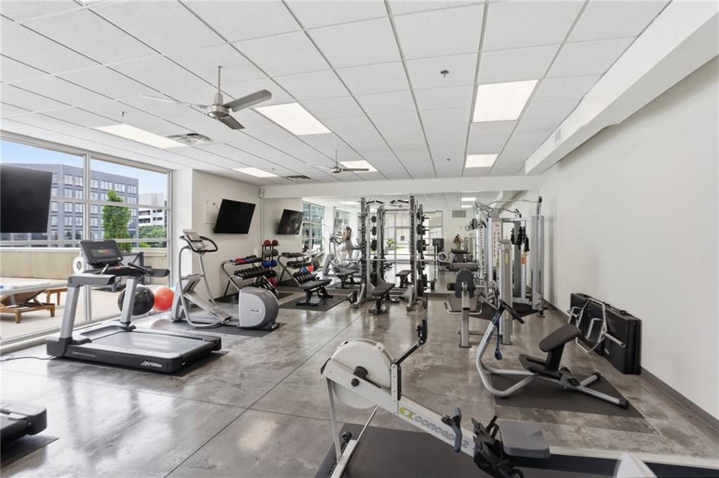 1100 Howell Mill Road Northwest, Unit 608 Atlanta, GA 30318 - Photo 27 of 37 a view of a room with gym equipment
