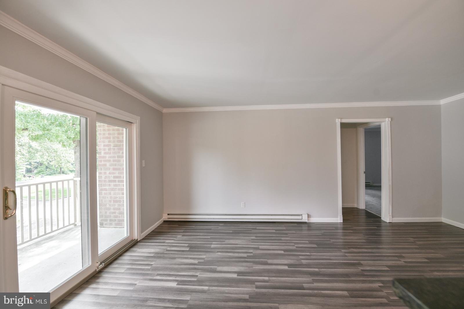 200 Campbell Circle, Unit E7 Downingtown, PA 19335 - Photo 7 of 28 Living Room Slider