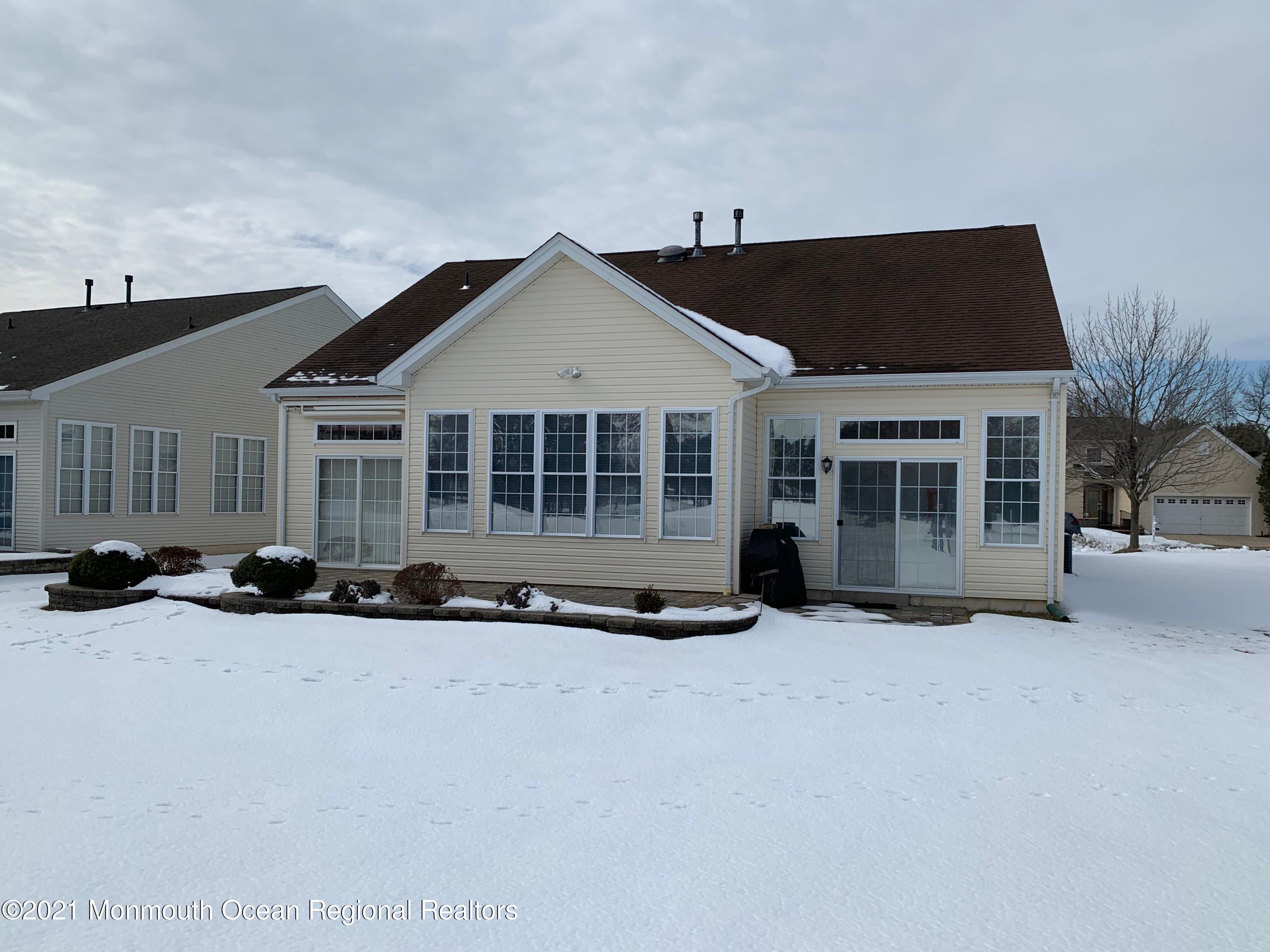 47 Shoal Road Jackson, NJ 08527 - Photo 3 of 56 a front view of a house with a yard