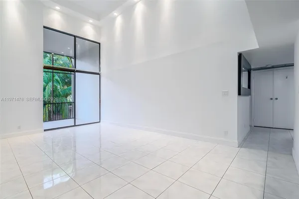an empty room with windows