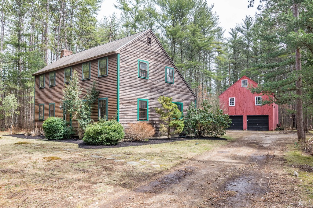 96 Middleton Road Boxford, MA 01921 - Photo 1 of 30 a front view of a house with a yard and tree