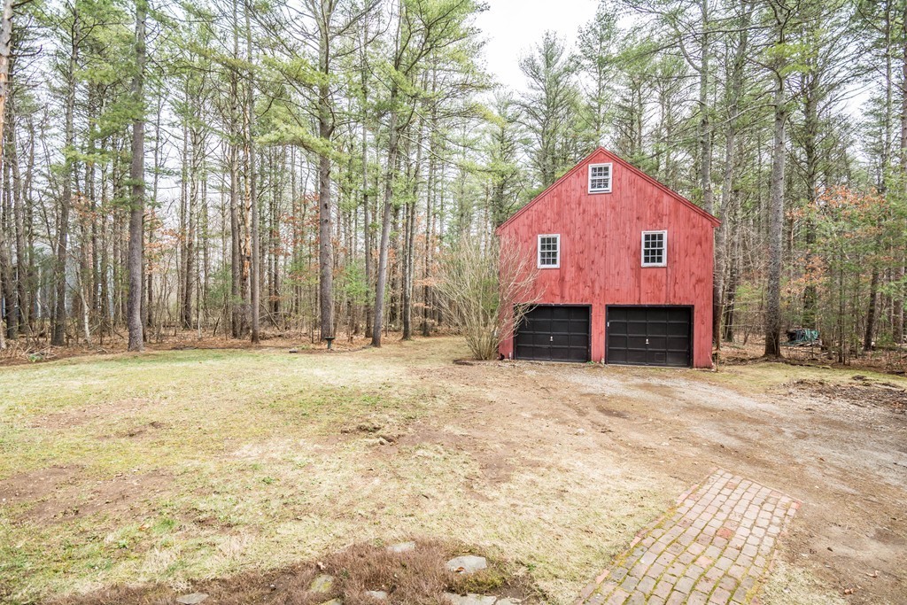 96 Middleton Road Boxford, MA 01921 - Photo 29 of 30 a front view of a house with a yard